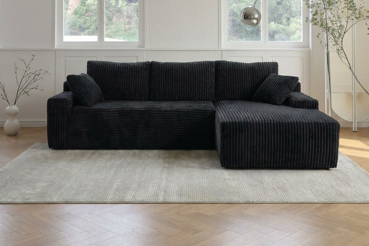An L-shaped couch between the living and dining areas