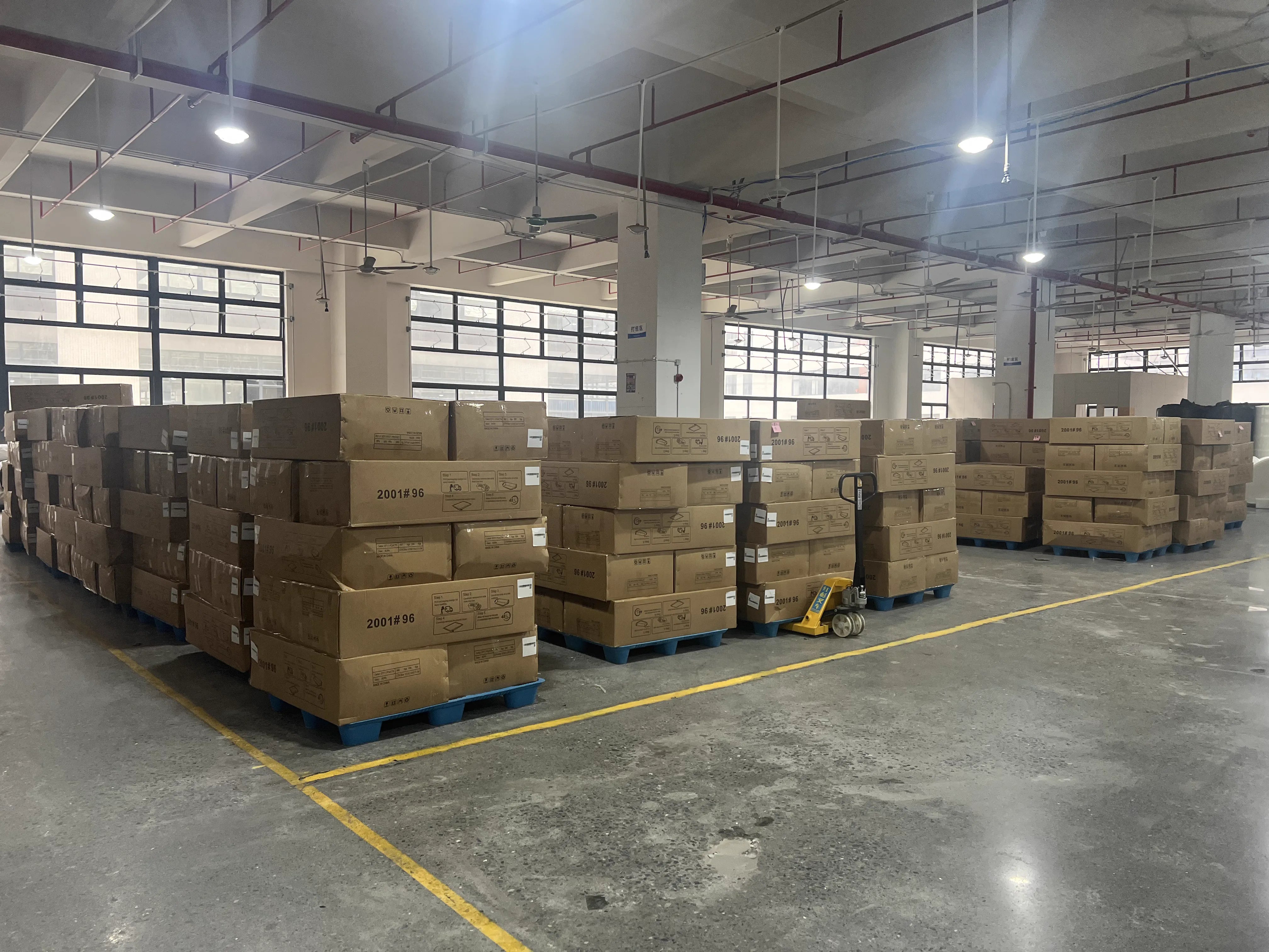 Compressed sofa cartons prepared for shipment